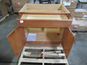 lot 122 image: Hampton Bay Assembled 36x34.5x24 in. Base Kitchen Cabinet with Ball-Bearing Drawer Glides in Medium Oak KB36-MO
