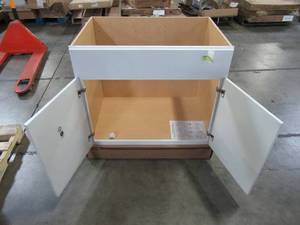 lot 123 image: Hampton Bay Shaker Assembled 36x34.5x24 in. Sink Base Kitchen Cabinet in Satin White KSB36-SSW