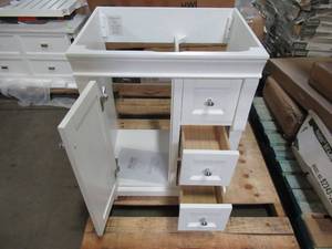 lot 134 image: Home Decorators Collection Naples 24 in. W Bath Vanity Cabinet Only in White with Right Hand Drawers NAWA2418D