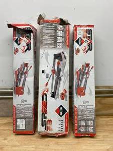 lot 82 image: RUBI Lot of 3 Tile Cutters.  2- 26 Star Max and 1- 28 Heavy Duty Professional Model