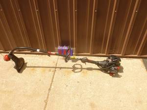 Craftsman 2 cycle weed trimmer. Lightly used. Tested & works. As shown.