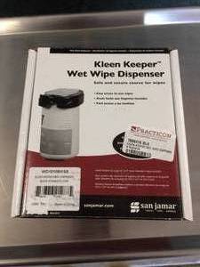 lot 12 image: Kleen Keeper Wet Wipe Dispenser, 5-34W x 7D, Wall Mount, Holds (1) 4 to 5 dia. Large Wipe Canister - Appears to have been used...