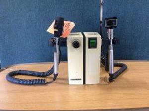 lot 14 image: Welch Allyn 74710 Wall Transformer Otoscope Ophthalmoscope With Heads - Good Working Condition However Green Power On Light Bulb Is Burned Out
