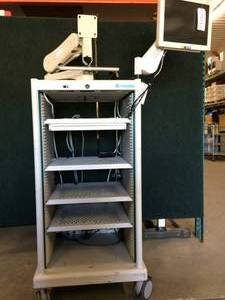 lot 40 image: Linvatec Industrial Mobile Endoscopy Storage Media Video Cart with Medxchange Monitor, Arms, Drawer & Multiple Shelves Plus Power Supply Plenty Of Uses For This Cart