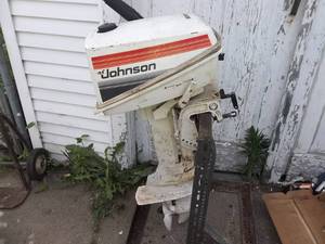 lot 36 image: Johnson Outboard With Stand 4.5 Hp.  (No Gas To Test But Has Compression)