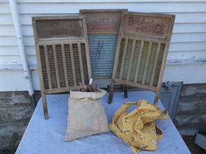 lot 48 image: 3-Wash Boards, 2-Bags Of Clothes Pins