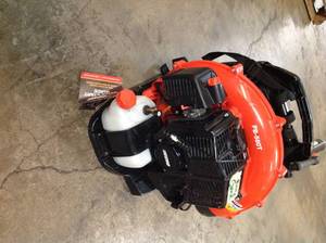 lot 39 image: ECHO 216 MPH 517 CFM 58.2cc Gas 2-Stroke Cycle Backpack Leaf Blower with Tube Throttle IN WORKING CONDITIONS