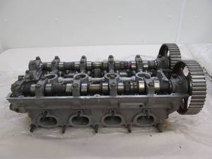 Dual overhead cam cylinder head