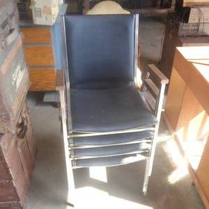 lot 12 image: Lot of 4 Vinyl Steel Framed Chairs