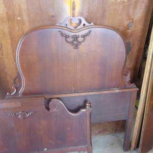 lot 24 image: Antique Black Walnut Twin Bed Set