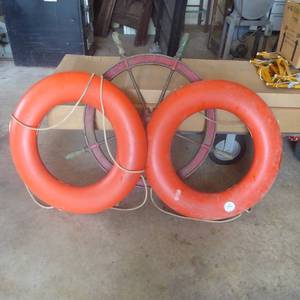 lot 27 image: Super Vintage Lot of  Life Preservers and Cast Iron Ship Wheel