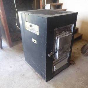lot 28 image: Wood Burning Furnace with Working Thermostat and Blower