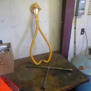 lot 86 image: Logging Tongs and Lug Wrench Lot