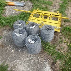 lot 135 image: Lot of 5 Rolls of Twisted Barbless Steel Cable and Fencing Tool