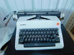 lot 16 image: Vintage Olympia Electric Typewriter