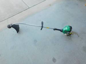 lot 72 image: Weed Eater Feather Lite