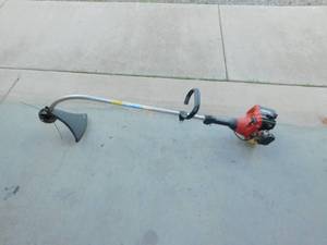 lot 74 image: Homelite Gas Weed Eater
