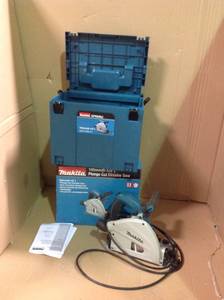 lot 9 image: MAKITA 12 Amp 6-12 in. Corded Plunge Saw with 55 in. Guide Rail, 48T Carbide Blade and Hard Case in good condition