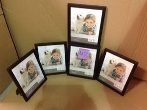lot 47 image: 8X10 Wood Frame Set  Black in good condition