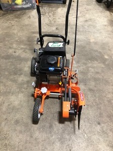 lot 203 image: Powermate 9 in. 79cc Gas Walk-Behind Edger with Curb Hopping Feature in good condition see pics 
