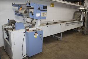 lot 1 image: Conflex Packaging, Inc. Horizontal Form Fill and Seal Wrapper CW160