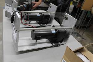 lot 59 image: Leeson Permanent Magnet D.C. Gearmotor CM34D25NZ57B