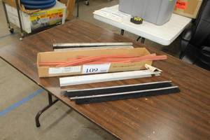 lot 109 image: Rubber Strips, Brackets, Machine Brushes, Steel Pipe