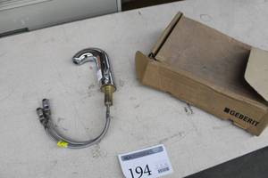 lot 194 image: Geberit Chrome Plated Sink Fixture with Stainless Steel Braided Lines