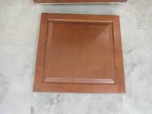 lot 9 image: Hampton Bay Assembled 24x34.5x24 in. Base Kitchen Cabinet with Ball-Bearing Drawer Glides in Cognac KB24-COG