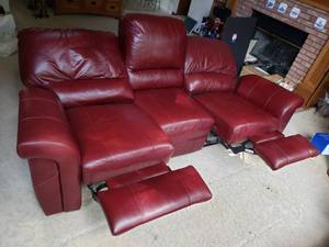 lot 1 image: Ox Blood Red Leather Recliner Couch by El Ray