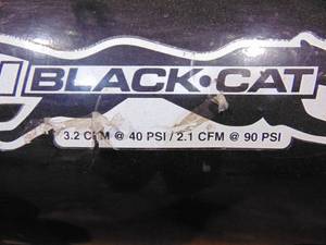 lot 31 image: Black Cat Air Compressor on Wheels