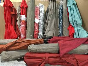 LOT WITH PATIO UMBRELLAS DIFFERENT SIZES & COLORS USED SEE PICS