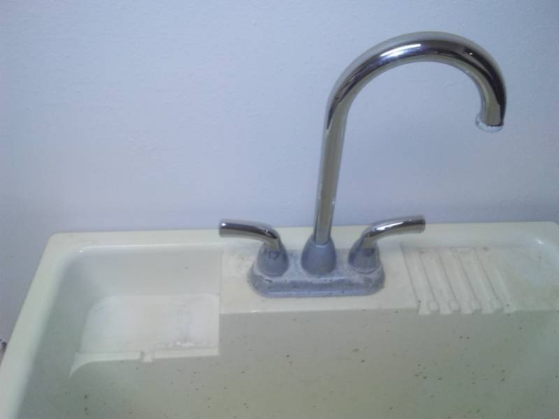 lot 22 image: Deep, basin scrub sink utility laundry.