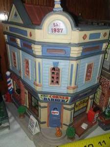 lot 56 image: 7 Christmas Village Buildings, Various companies.
