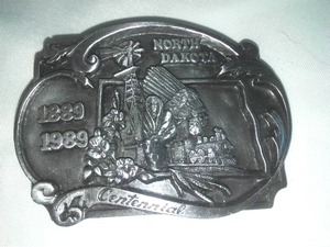 lot 475 image: North Dakota Centennial Belt Buckle 1989.