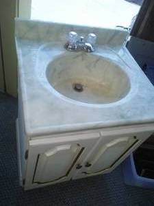 lot 455 image: Bathroom Vanity & Moen faucet.