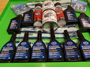 lot 32 image: 26 new shop supplies stripper, paint, addictives used in all shops