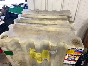 lot 19 image: Commercial 110-Gallon Bulk Tote With Steel Stand