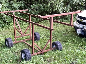 lot 24 image: Custom Made Steel Frame With Wheels & Tires