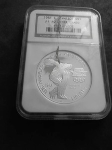 1983 S Olympics 23rd Olympiad Silver One Dollar Comemmorative In NGC Graded Holder PF69 Ultra Cameo