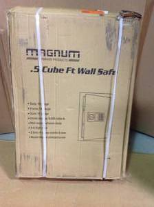 MAGNUM 0.58 cu. ft. Wall Security Safe&nbsp&nbspin good condition