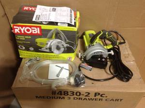 lot 80 image: Ryobi 4 Hand Held Tile saw-  in good condition tool only no blade