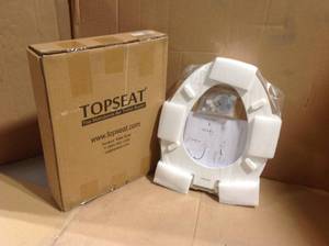 lot 36 image: TOPSEAT TinyHiney Elongated Slow Close Potty Seat &nbspin good condition