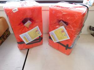 lot 42 image: 8 - NEW West Marine Life Jackets
