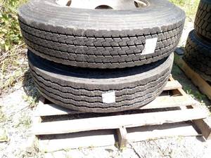 lot 1 image: (2) Recap 11R22.5 Tires on Hub Pilo...
