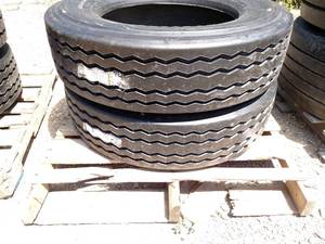 lot 13 image: (2) Recap  27570RR22.5 Tires...