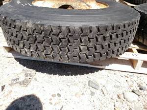 lot 44 image: Recap 11R22.5 Tire on Hub Pilot Rim...