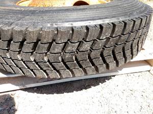 lot 45 image: Recap 11R22.5 Tire on Hub Pilot Rim...