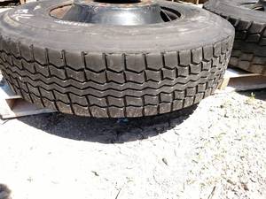 lot 46 image: Recap 11R22.5 Tire on Hub Pilot Rim...