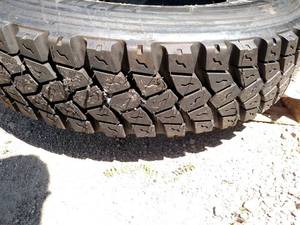 lot 50 image: Recap 27580R22.5 Tire...